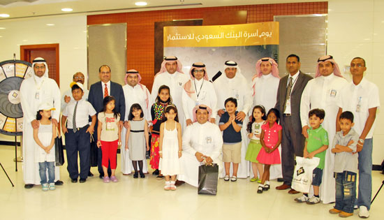 Nawaf Al-Egla DISTRIBUTING GIFTS FOR CHILDREN