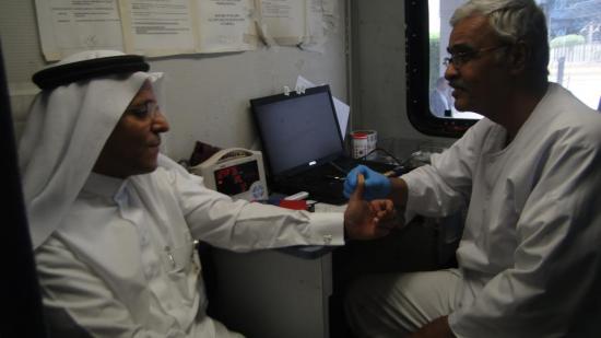 Mr. Musaed Al-Mineefi, General Manager of the Bank participating in the blood donation campaign