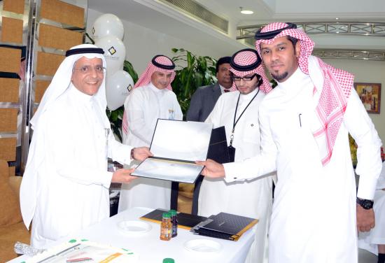Mr. Fahad Eshaq receives his certificates from the GM