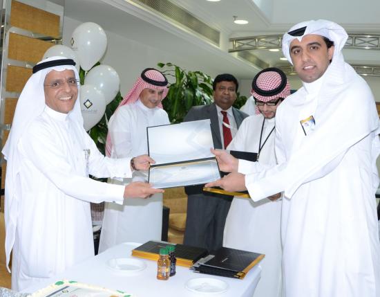 Mr. Fahad Eshaq receives his certificates from the GM