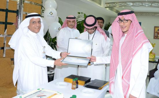 Mr. Fahad Eshaq receives his certificates from the GM