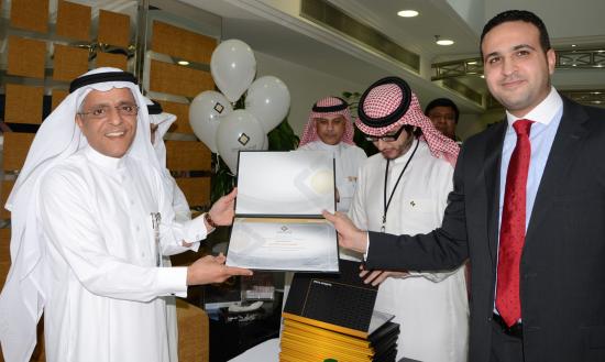 Mr. Fahad Eshaq receives his certificates from the GM
