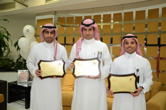 Sultan AlMoamaar, Firas alturaif, and Abdulelah bin Zaraah holding the awards after completing the New Graduates Program